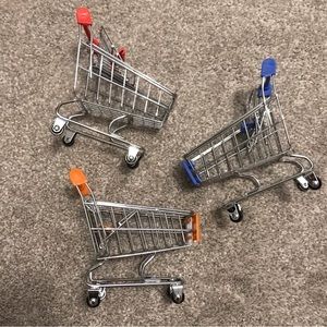 Threes little shopping carts that the wheel actually work meant for kids play